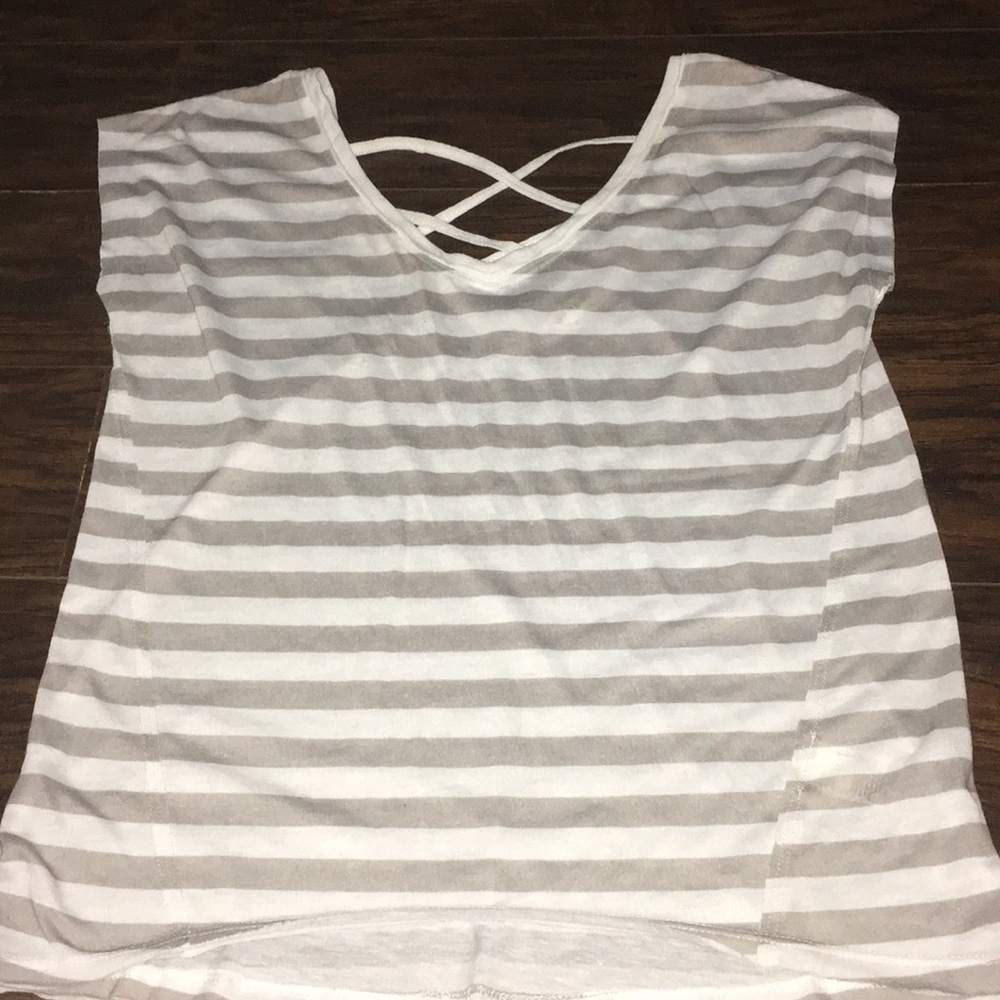 Striped shirt with open back cross.
